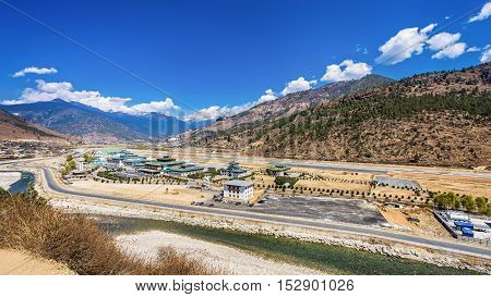 mountain landscape with village and mini airport