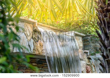 The landscape of beautiful waterfall in garden