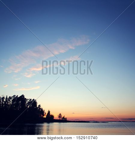 Beautiful Sunset. Russian North. Lake And Trees.