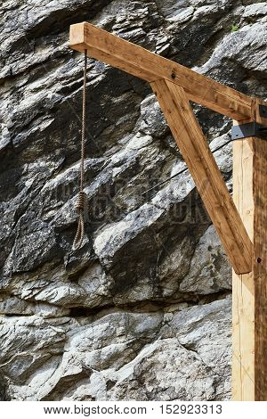 Old Wooden Gallows in Front of the Crag