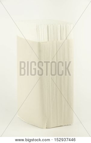 Paper napkins. Stand. Vertical photo, white background