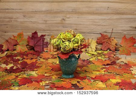 Bouquet / Homemade rose from multicolored autumn leaves