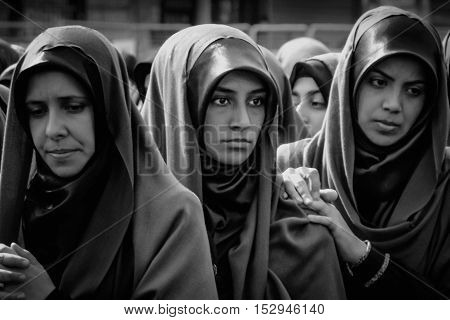 Istanbul Turkey - October 11 2016: Muslims worldwide marks Ashura Istanbul Shiite community. Turkish Shia Muslims mourning for Imam Hussain. Caferis take part in a mourning procession marking the day of Ashura in Istanbul's Kucukcekmece district Turkey