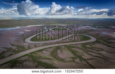 Fancy a swim on the wild side. Aerial view of tidal crocodile infested rivers near Wyndham in Western Australia.