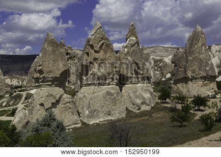 Vertical rock formations at Love valley in Turkey in the afternoon sunlight