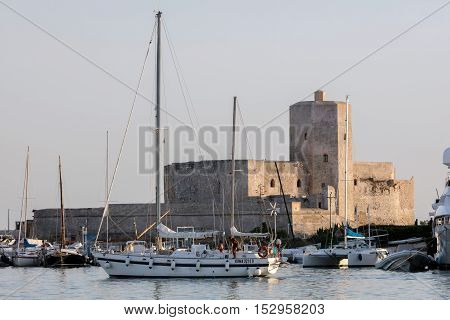TRAPANI ITALY - AUGUST 10 2016: Castle of Colombaia located on a small island in front of the Trapani's harbor. This is one of the oldest monuments in the city tracing its origins to antiquity.