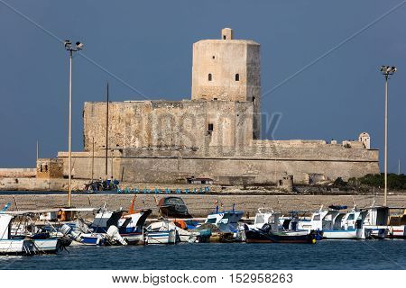 TRAPANI ITALY - AUGUST 11 2016: Castle of Colombaia located on a small island in front of the Trapani's harbor. This is one of the oldest monuments in the city tracing its origins to antiquity.