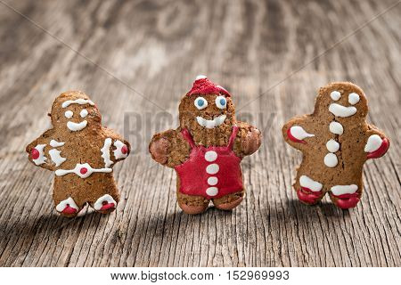 Tree Decorated Gingerman Cookies On Rustic Wooden Background