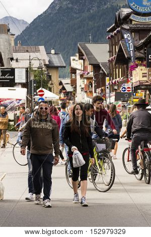 Livigno, Italy - August 1: Tourists Shopping On The Streets Of Duty-free Area On 1 August 2016 In Li