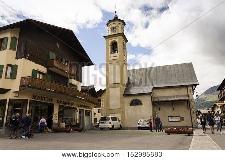 Livigno, Italy - August 1: Tourists Shopping On The Streets Of Duty-free Area On 1 August 2016 In Li