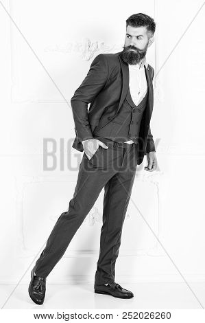 Suited Man With Tailored Suit And Posing Indoors. Men Clothing, Boutiques. Tailor, Tailoring. Stylis