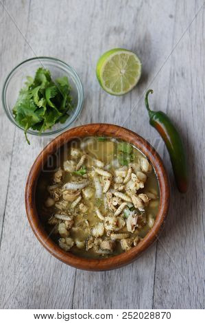 Pozole (hominy), Cilantro (coriander), Jalapeno Peppers, Onions, Tomatillo, Lime, And Pork With Wax 