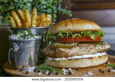 Delicious Burgers With Beef, Tomato, Cheese And Lettuce