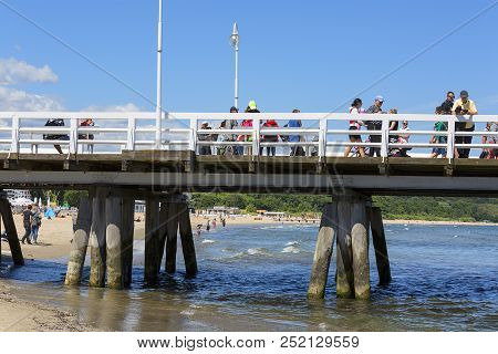 Sopot, Poland - June 6, 2018: Wooden Sopot Pier In Sunny Day. It Is The Longest Wooden Pier In Europ