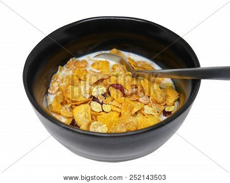Crispy And Healthy Organic Breakfast Cereal Flakes With Red Dried Cranberry And Cold Soy Milk In Dar
