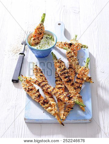 Sesame Crusted Grilled Young Carrots With Greek Yogurt Dip