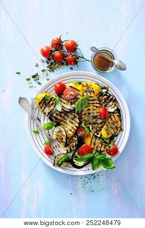 Grilled Zucchini And Eggplant Salad With Basil And Cherry Tomatoes.