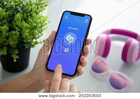Alushta, Russia - July 27, 2018: Woman Hand Holding Iphone X With Music Service Shazam On The Screen