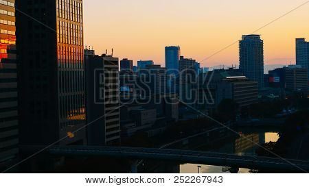 Business Ideas For Real Estate - City Scape, Silhouette Of Building With Sunlight In Morning.