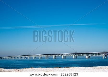 The Classic View Of The Bridge Along With Osaka Skyline Is The Beautiful Blue Sky In The Morning.