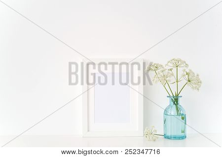 Cute Summer White Portrait A5 Frame Mock Up With A Wild Host In Transparent Blue Vase. Mockup For Qu