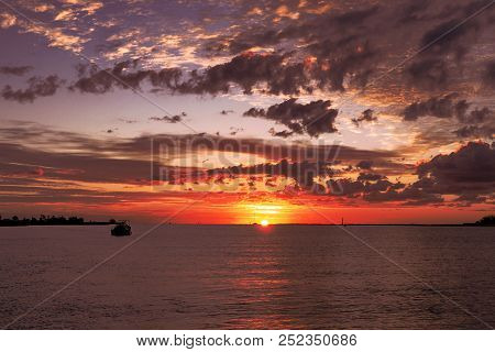 Australian Summer Seascape, Waterscape, Pink Grey And Red Sunset With Primarily Stratocumulus Clouds