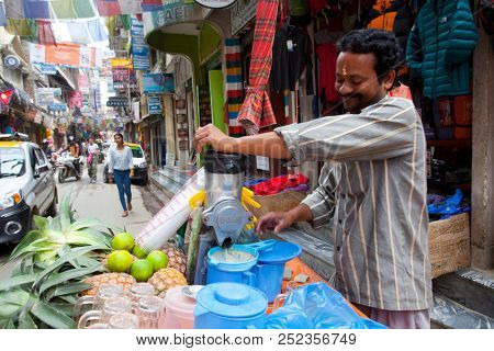 KATHMANDU, NEPAL - JULY 17, 2018: Street in the Thamel district, Kathmandu. Thamel is a tourist district with many hotels, souvenir shops, restaurants and nightlife