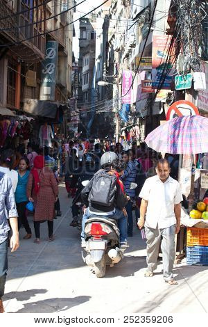 KATHMANDU, NEPAL - JULY 17, 2018: Street in the Thamel district, Kathmandu. Thamel is a tourist district with many hotels, shops and restaurants