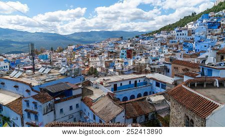 Chefchaouen, Morocco - April 2018: Chefchaouen Panorama, Blue City Skyline On The Hill, Morocco