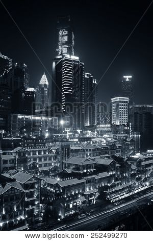 CHONGQING, CHINA â MARCH 13: Hongyadong shopping complex at night on March 13, 2018 in Chongqing. With 17M population, it is the most populous Chinese municipality.