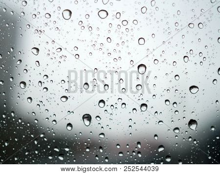 Close Up Of Raindrop On Car Window