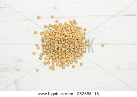 Lot Of Whole Raw Chickpeas Kabuli Variety Heap Flatlay On Grey Wood