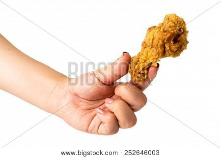 Fried Chicken In Hand Close-up On White Background.