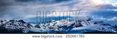 Beautiful Sunset And Cloudsy Landscape In Alaska Mountains