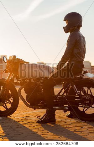 Sexy Biker Young Woman In Black Trendy Leather Jacket Sit On Vintage Custom Made Caferacer Motorcycl