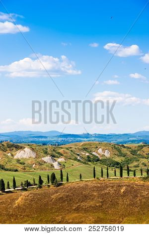 Road And Cypresses On A Hill Near Asciano In Crete Senesi, Tuscany, Italy