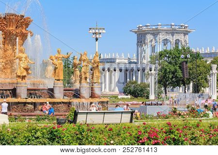 Moscow, Russia - August 01, 2018: Fountain Friendship Of Peoples Against Pavilion Culture On Exhibit