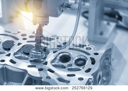 The Boring Machine Make The Hole At The Cylinder Head In The Light Blue Scene.automotive Part Manufa