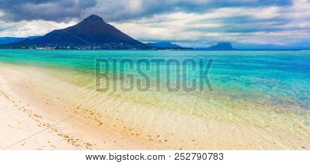 Sandy tropical Wolmar beach at sunny day. Beautiful landscape. Panorama. Mauritius