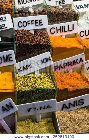 Background Of Different Dry Color Spices In Boxes
