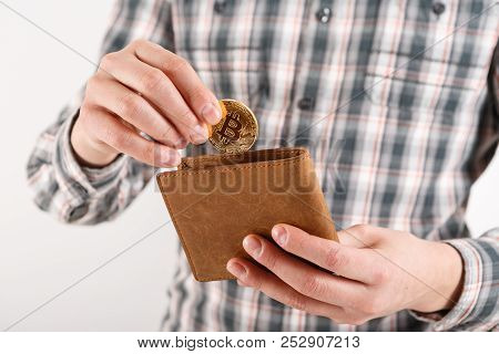 Businessman Holding Bitcoin. Golden Bitcoin Coin In Men Hands, Pened Wallet. Virtual Currency. Crypt