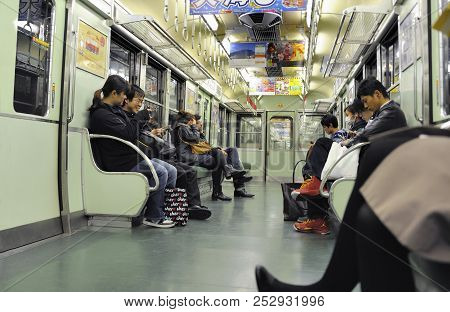 Kyoto, Japan- November 04, 2014; People Ride In The Keihan Subway. Keihan Railway Company Was Founde