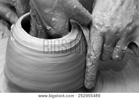Process Of Making Clayware On Potter's Wheel