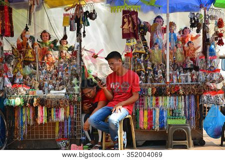 Manila, Ph - Oct. 5: Vendors Selling Statue Figures Outside Quiapo Church On October 5, 2019 In Mani