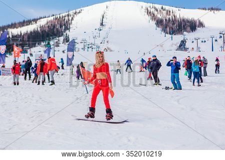 Sheregesh, Kemerovo Region, Russia - April 12, 2019: Young Happy Pretty Woman Dressed In Carnival Co