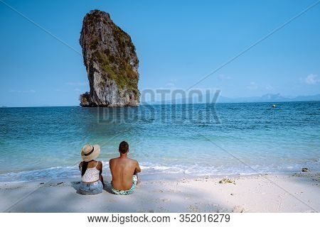 Couple On The Beach, Koh Poda Thailand, The Beautiful Landscape Of Koh Poda Or Poda Island In Krabi 