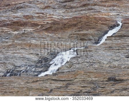Beauty Waterfall Near Austerdalsvatnet Lake And European Svartisen Glacier In Nordland County In Nor