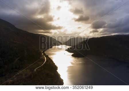 Beautiful Aerial Drone Landscape Image Of Glorious Autumn Fall Sun Over Thirlmere In Lake District