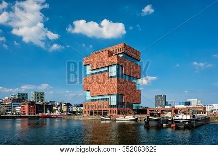 ANTWERP, BELGIUM - MAY 26, 2018: Museum aan de Stroom MAS is a museum located along the river Scheldt designed by Neutelings Riedijk Architects an example of postmodern Art Deco architecture
