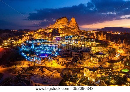 Aerial View Of Uchisar Castle At Night In Cappadocia, Turkey.
